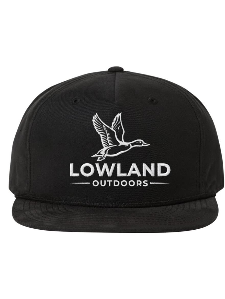 Black baseball cap with white embroidered Lowland Outdoors logo featuring a flying duck.