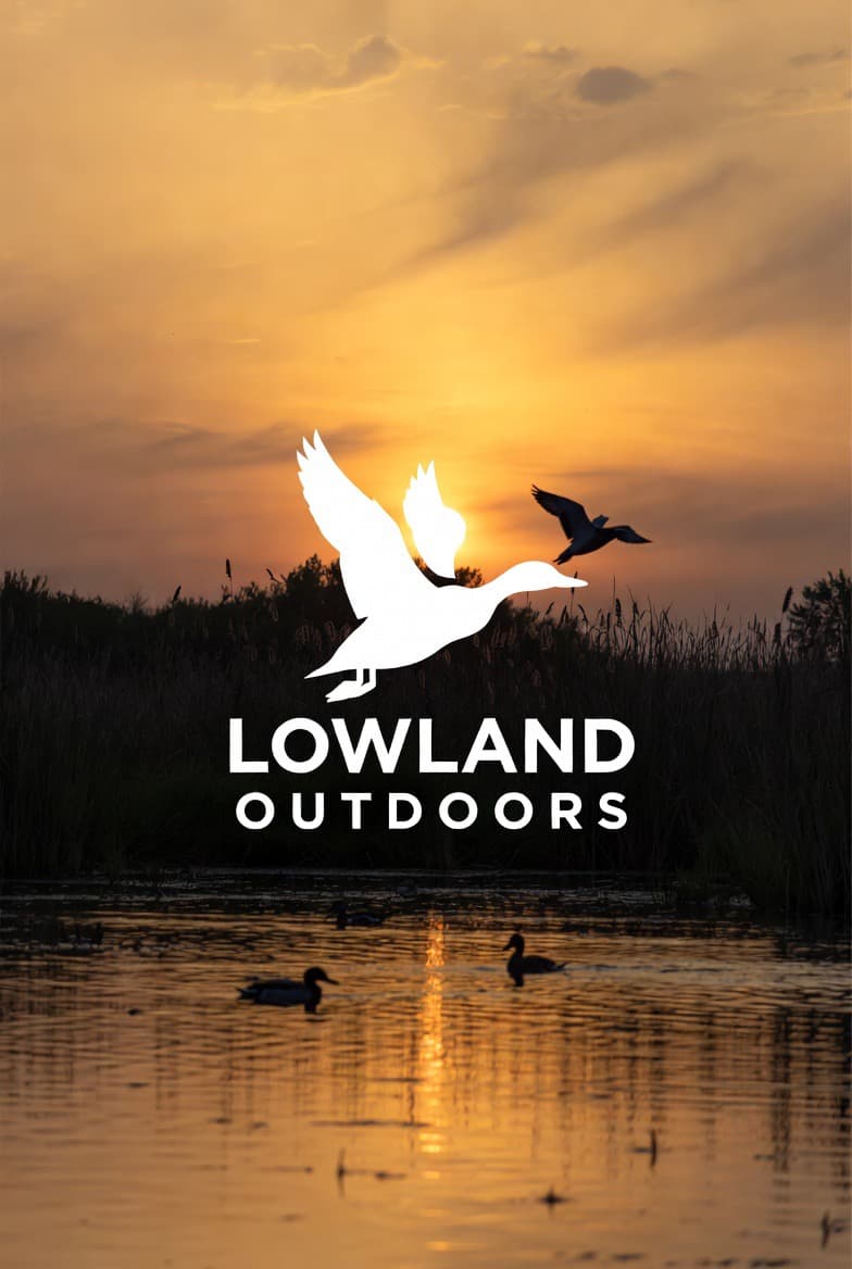 Lowland Outdoors logo featuring a white duck silhouette over a golden sunset marsh landscape.
